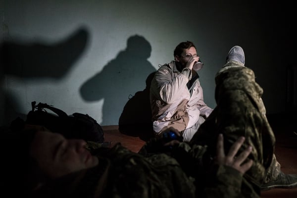 Sasha and Maxim just arrived in Pripyat, drinking water and resting after 20 kilometers of walk at night