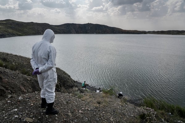 Amir Kayirjanov, a scientist at the Kurchatov nuclear center while observing some fishermen fishing in the atomic lake, one of the most contaminated places on the Semipalatinsk shooting range Many people come to the atomic lake to fish.