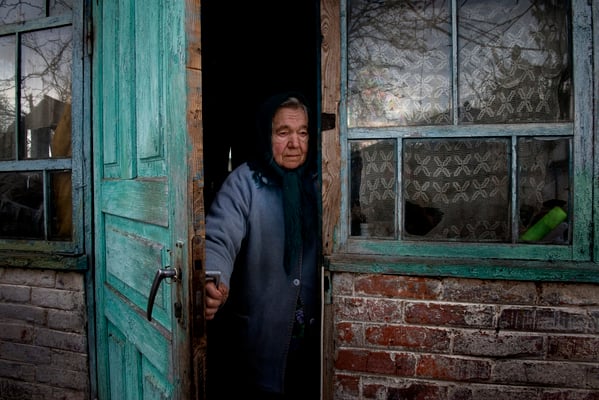 Maria Semenyuk, 78 years old, in her home waiting for her husband Ivan. On May, 17th 2016 Maria has died after living all her life in her home. She was buried in Paryshev cemetery. Paryshev, Chernobyl Exclusion Zone.
