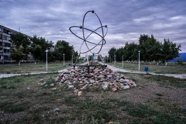 Monument to the atom in the city of Kurchatov  Kurchatov City is a town in East Kazakhstan Region in north-east Kazakhstan. Named after Soviet nuclear physicist Igor Kurchatov, the town was once the centre of operations for the Semipalatinsk Test site