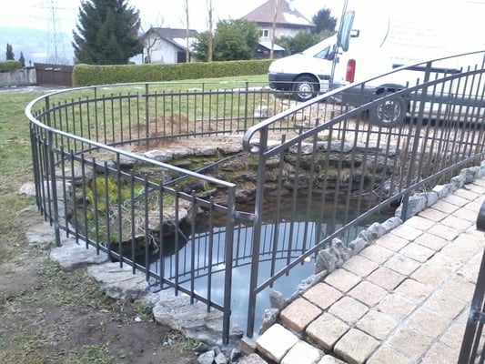 Rampe artisanale grenobloise, garde corps en fer forgé sur mesure.