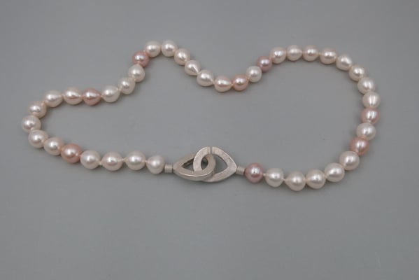 Perlen mit Sandgussverschluss