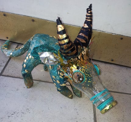 Piggy bank dinosaur creature - Paper maché, glass bottle, string, wire, beads [SOLD]
