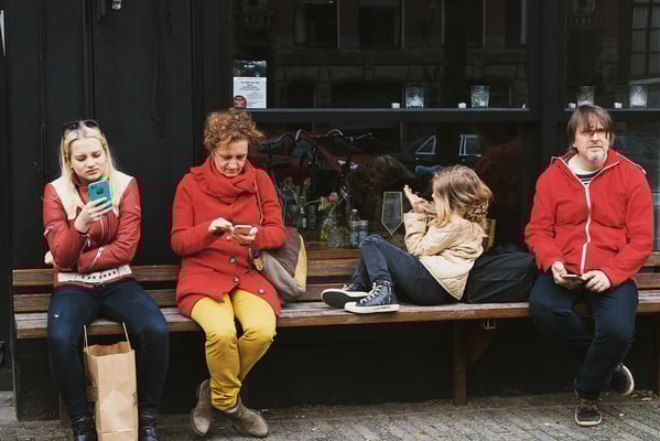 'one child is playing with her hair'