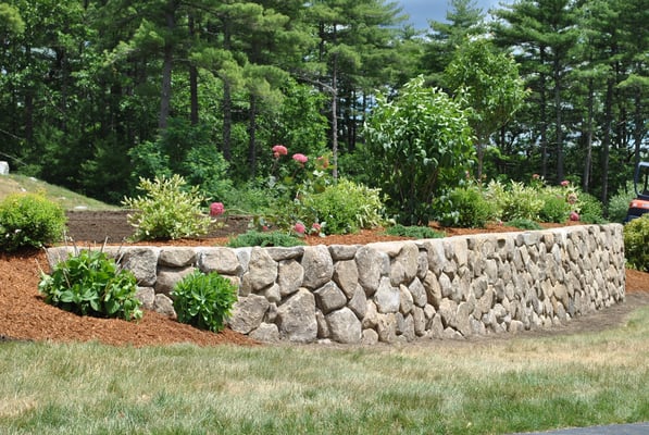 Natural stone retaining wall