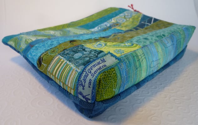 ...aufwändig freihand gequiltet...