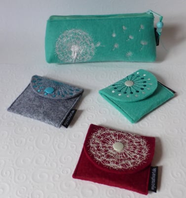 Brillenetui und Mini-Filztäschchen mit verschiedenen Stickmotiven (Stickdateien: Rock-Queen)