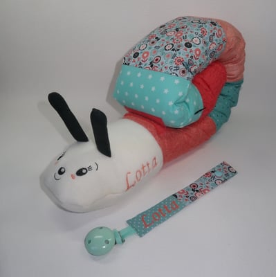 Puckschnecke als Lagerungskissen für Babys, mit passender Schnullerkette, mehr unter Babys + Kleinkinder, Puckschnecken