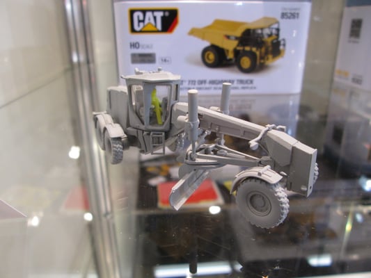 Urmodell des Cat 12M3 Graders von Diecast Masters 1:87