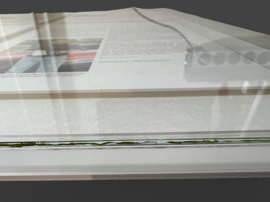 Entspiegeltes Bilderglas mit Distanzleiste auf Mass