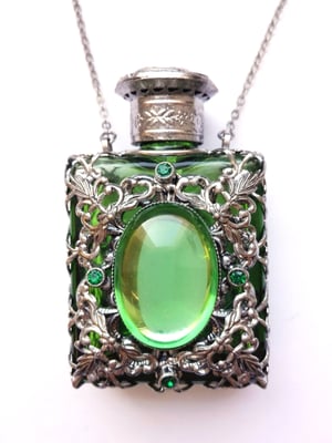 Photo 1 : ref. 469986 :  H.6.7 cm / 10 ml  / Collier en chaîne 76 cm