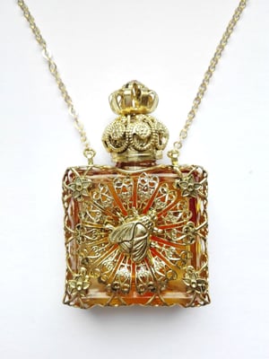 Photo 1 : ref. 481957 :  H. 5.8 cm / 7 ml / Collier en chaîne 76 cm