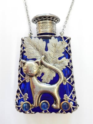 Photo 9 : ref. 481886 :  H. 6.8 cm / 10 ml / Collier en chaîne 76 cm