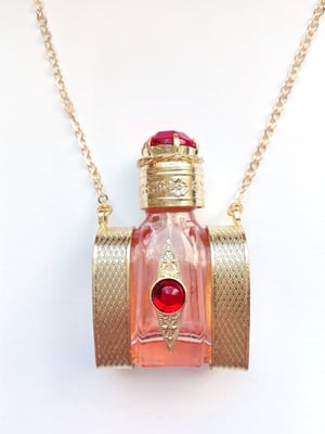 Photo 1 : ref. 458523 :  H. 5.2 cm / 5 ml  / Collier en chaîne 76 cm