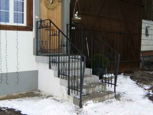 Treppengeländer mit alten Zaunteilen