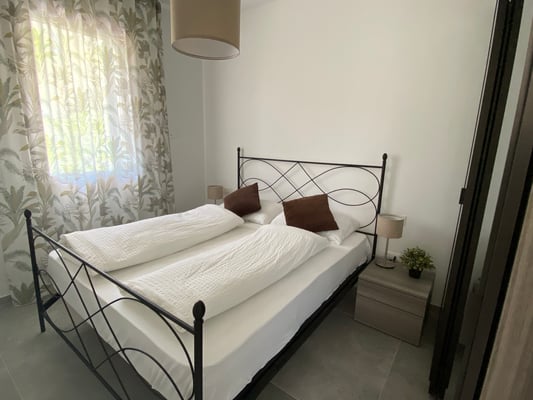 Schlafzimmer EG - Ferienhaus Albarella - gemütlich und stilvoll