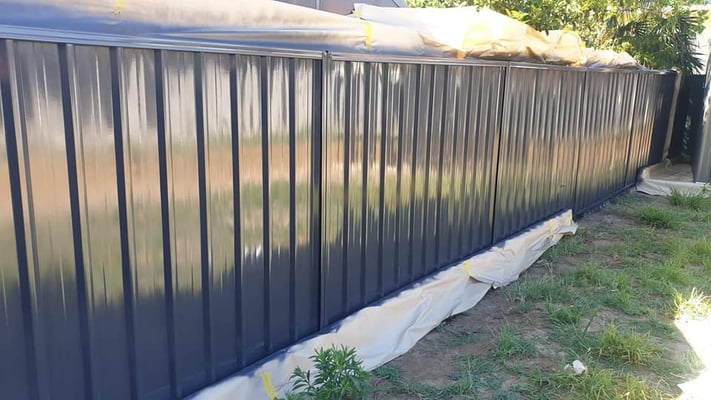 Professionally spray painted Colorbond fences for a home in Sydney by Alpha Coatings.