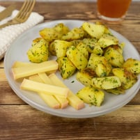 Patate rosolate con formaggio