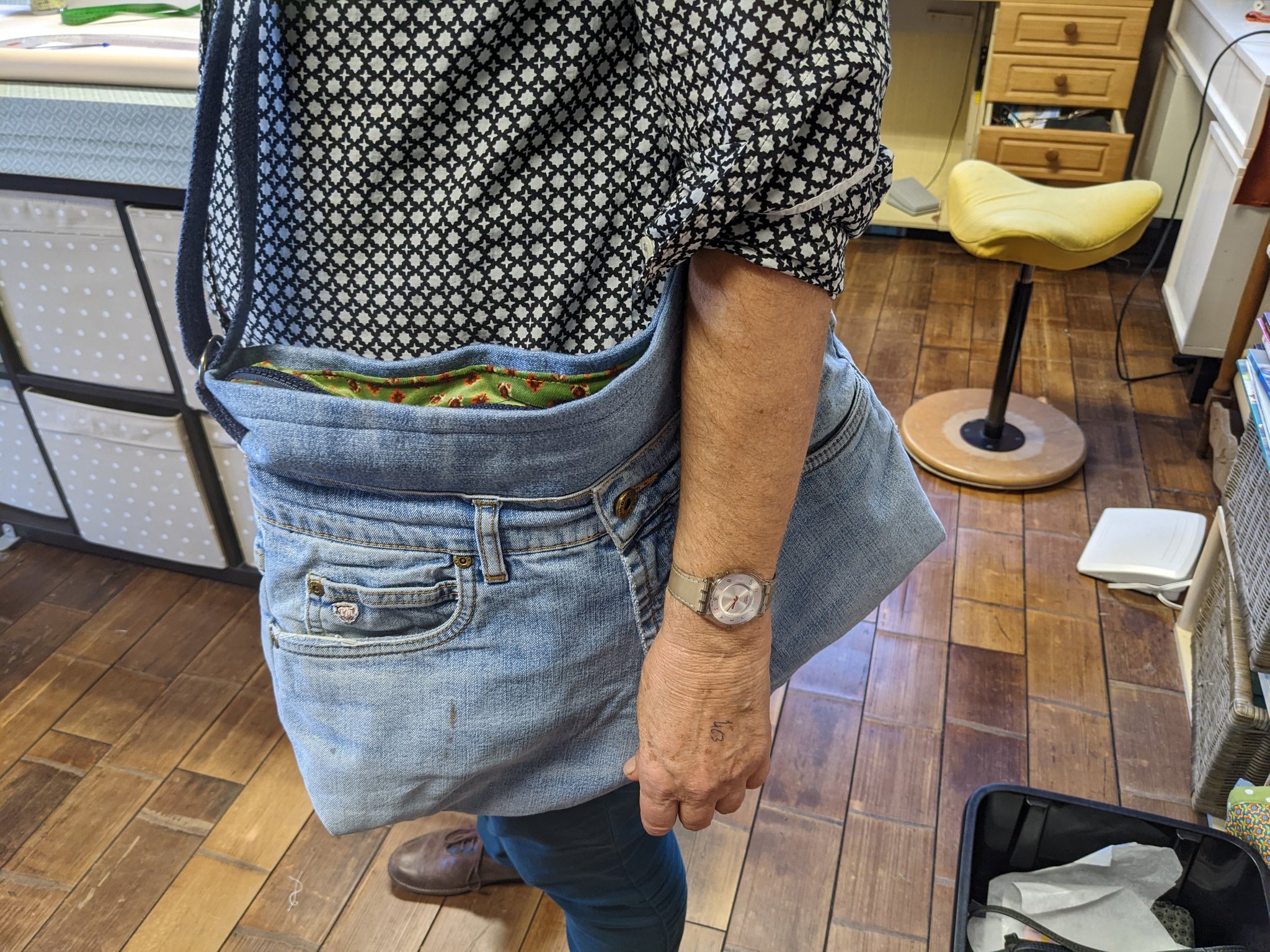 Zak van jeansbroek  met voering en paspelzak met rits 