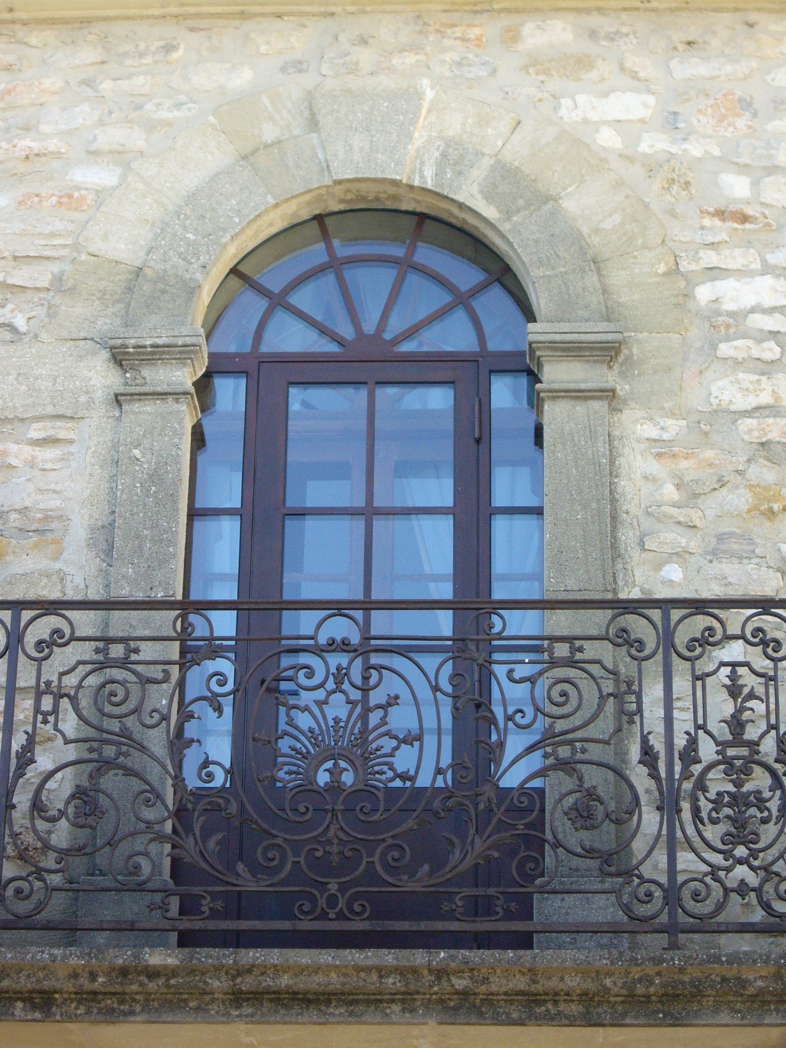 Menuiserie cintrée à double joint d'étancheité, finition patine rouille, Fontanes, Gard (30) Métalu d'Oc