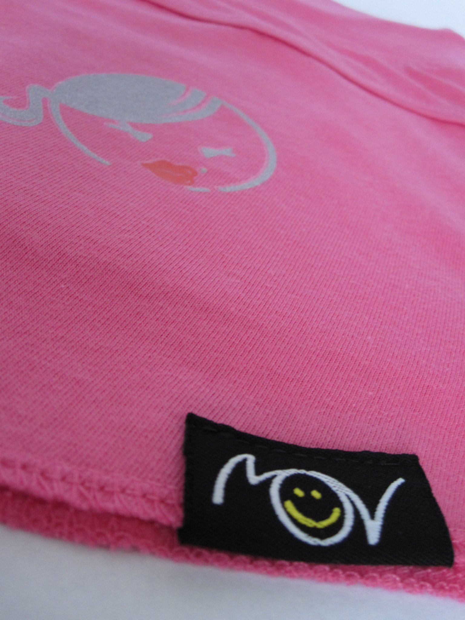 etichetta jacquard con piegatura x andare fondo capo