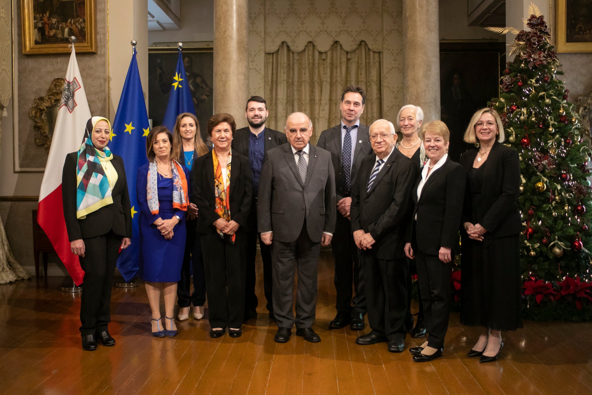 IOI Governing Board members and IOI HQ staff with H. E. George Vella