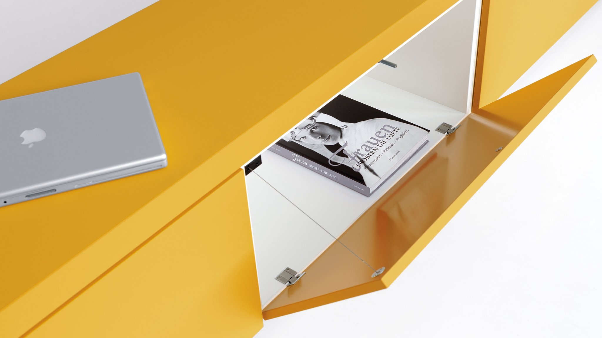 The bureau-style fold-down front opens from top to bottom and is useful for placing things on temporarily.