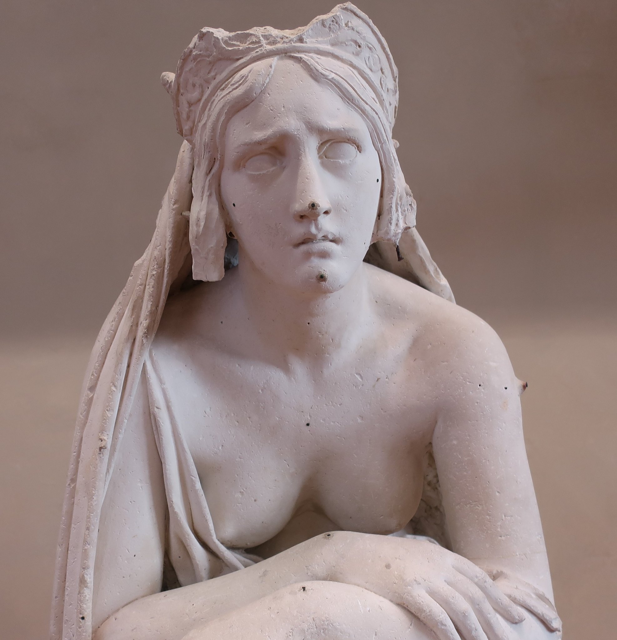 A mourning female statue accompanying the Pisa Cemetery