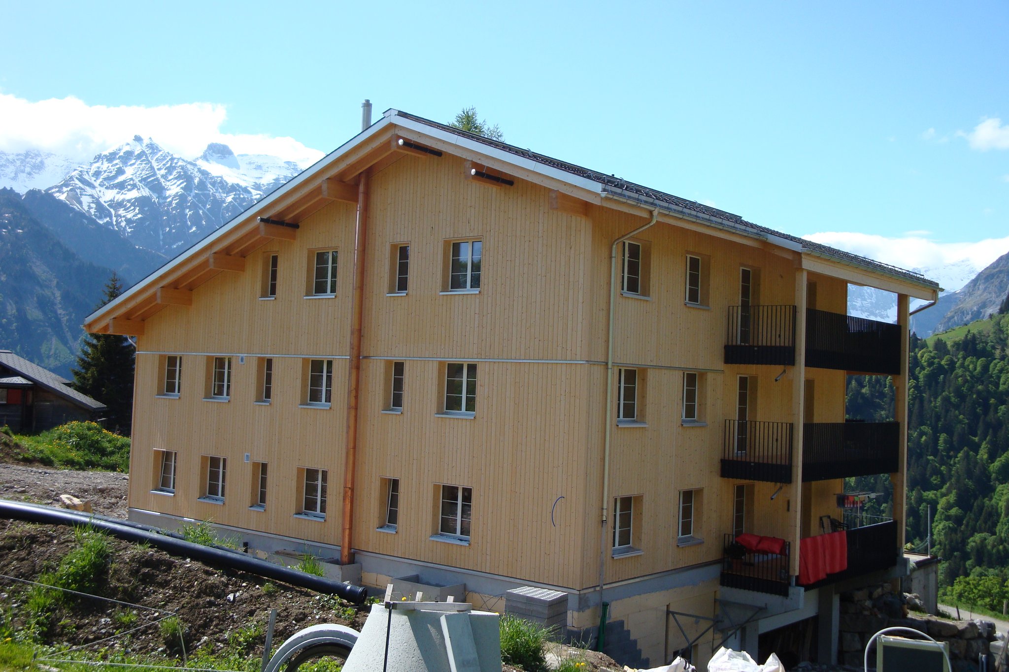 Wiederaufbau Mehrfamilienhaus, Braunwald
