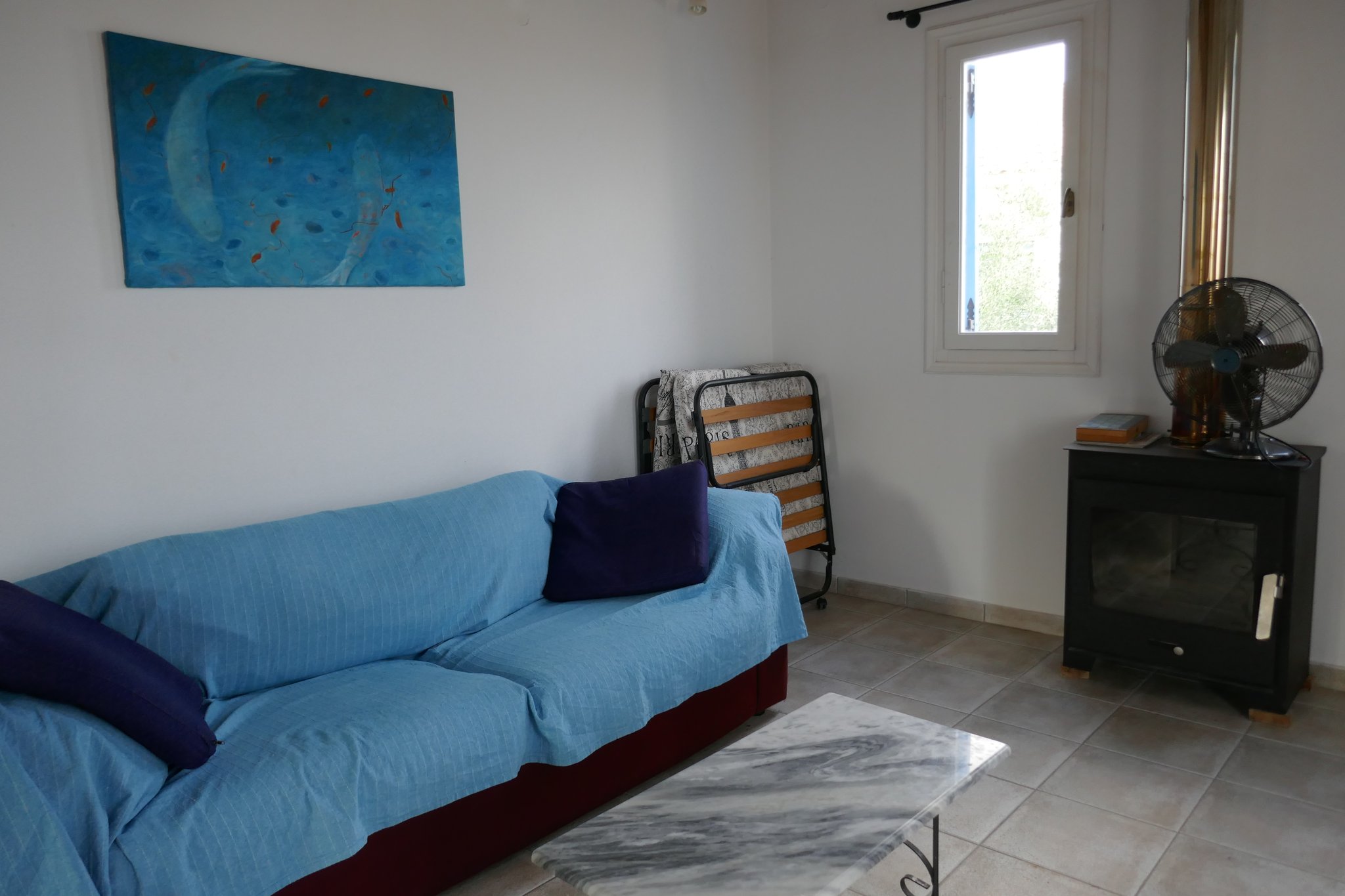 Apollon Wohnzimmer mit Ofen