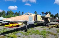 Old Soviet jet fighter with camouflage paint in Riga Aviation Museum