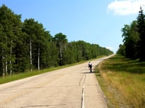 Cyclists listening to ultra long-distance endurance cycling stories from the Manitoba Randonneurs. 