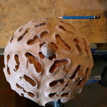 Turned and carved piece I'm working on to serve as an architectural boss cover