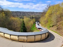 Red Sigulda bobsleigh track running through forest in Gauja National Park