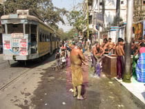 Washing on the street. (Kolkata)