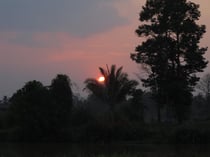 Sunset over a village in eastern Thailand