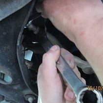 Garage Cognac : remplacement de la biellette pour le parallèlisme