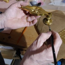 Application de feuille d'or