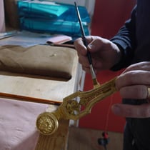 Application de feuille d'or