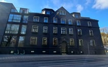 Black and gold facade of Riga's A22 Hotel