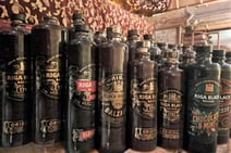 Brown ceramic bottle of Riga Black Balsam