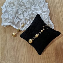 Boucles d'oreilles perles dorées