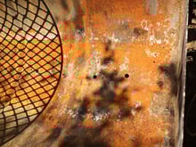 Verbesserungsvorschlag "Löcher" für den traditionellen Braaistand (Standgrill)