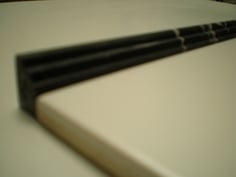 Profilo in marmo Nero Marquinia