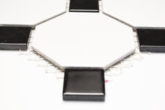 mosaico ceramica ottagono bianco nero