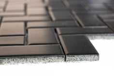 mosaico in ceramica colore nero forma lisca di pesce opaco