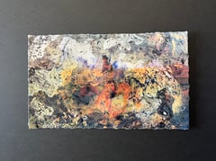 Graphic mounted on black cardboard