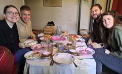 Table with Soviet-era delicacies and porcelain crockery