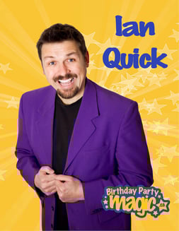 Ian Quick - magician for kids wearing a purple jacket