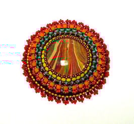 Brosche "Auge der Sonne"